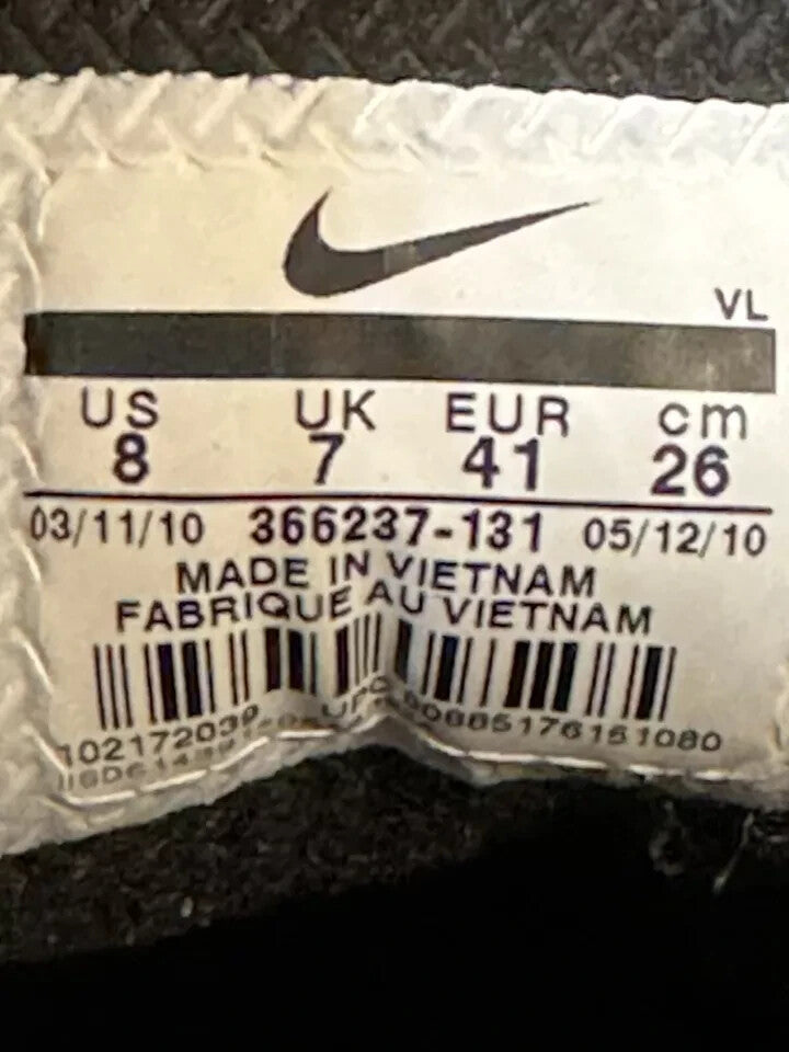 6973695