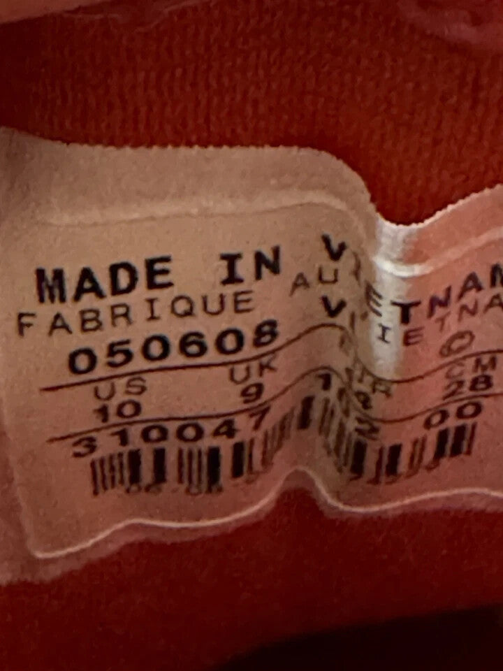 6973677