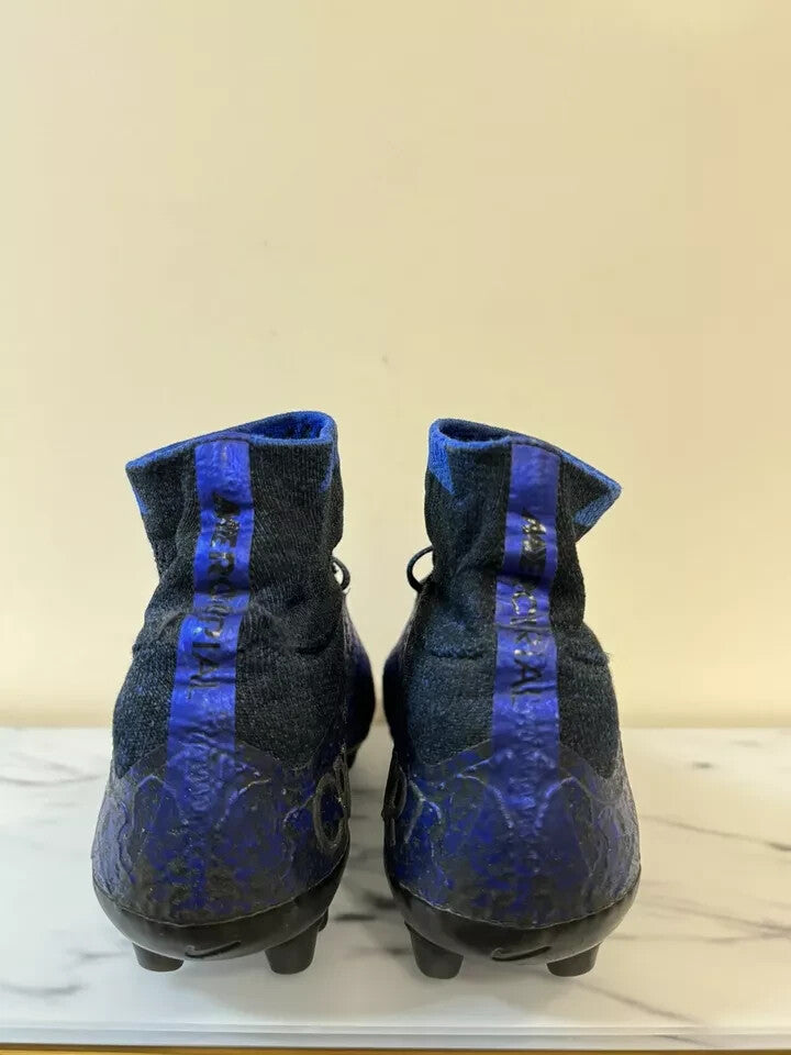 6973631