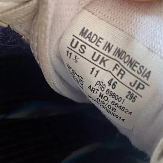 6973702