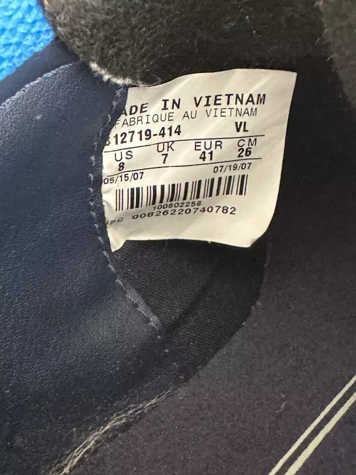 6973707
