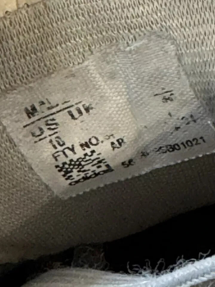 6973699