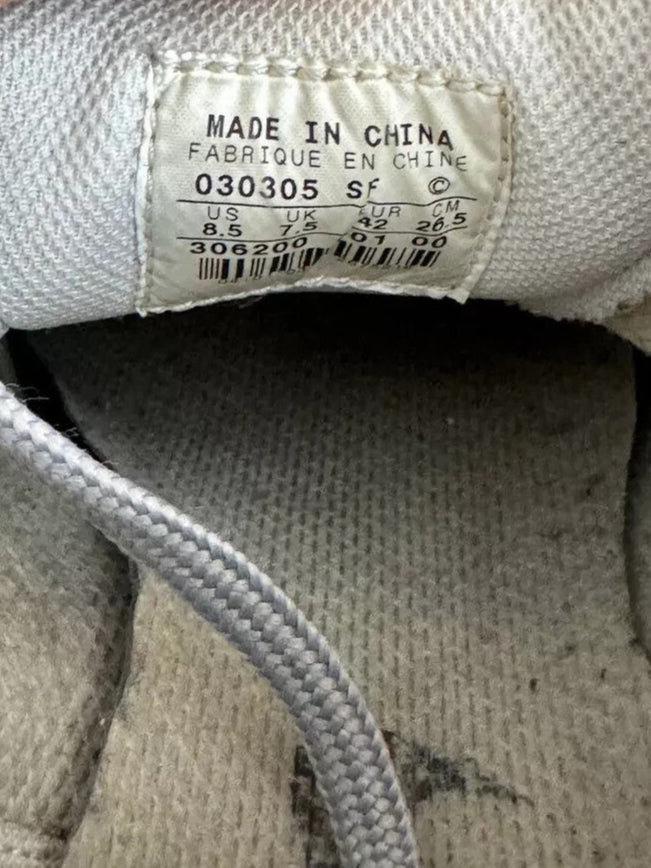 6973897