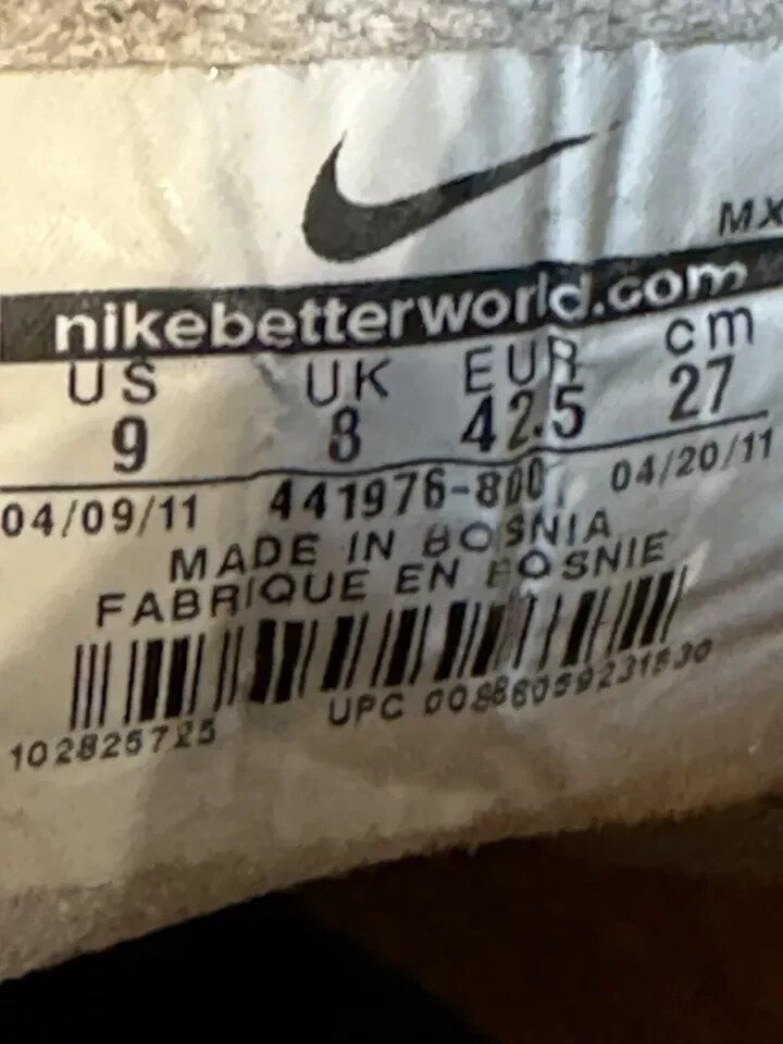 6973815