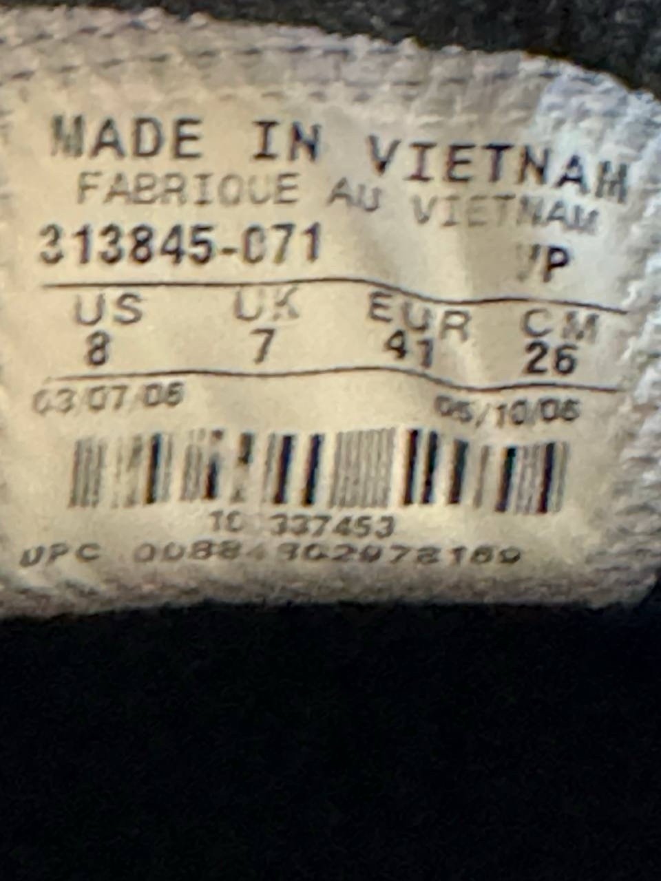 7698356