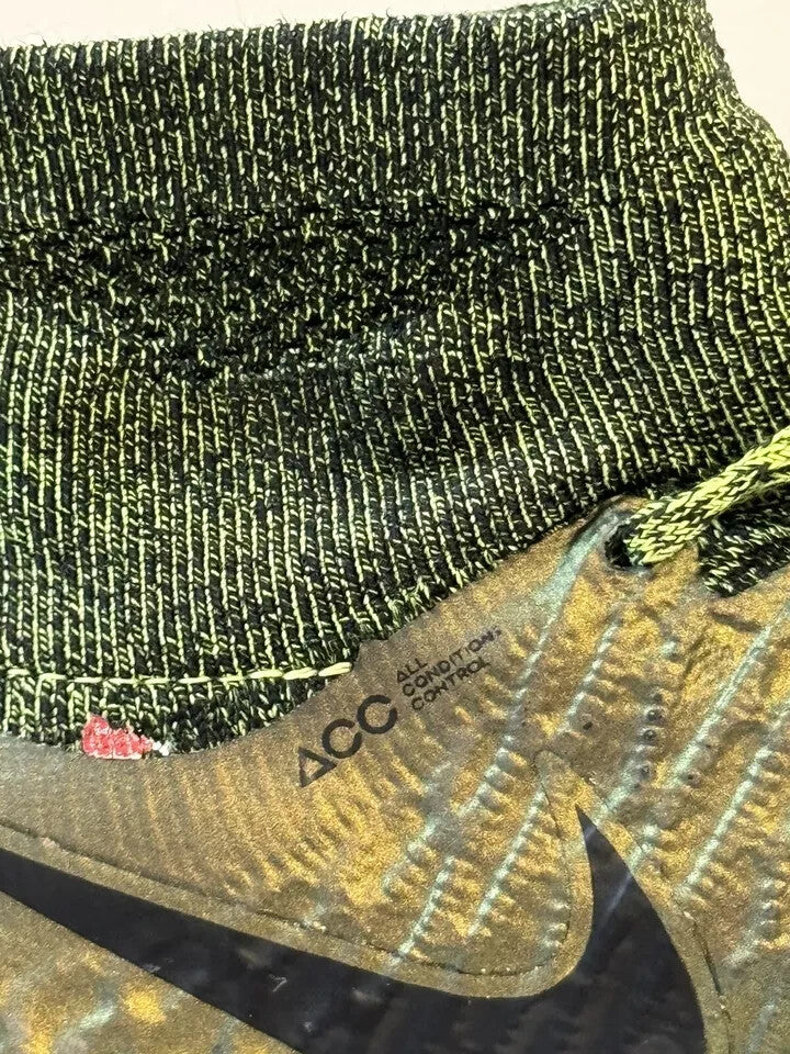 6973771