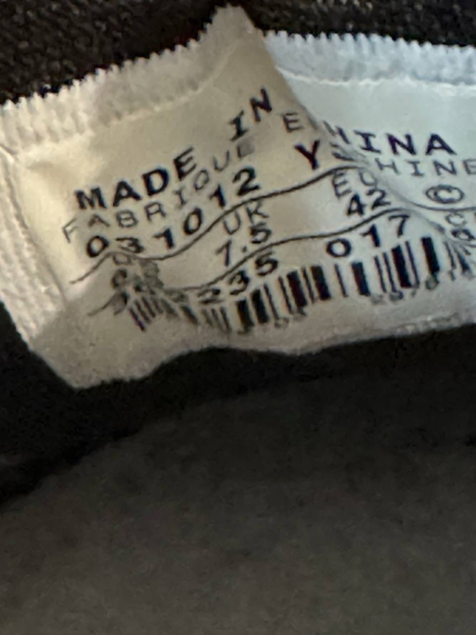 7698828