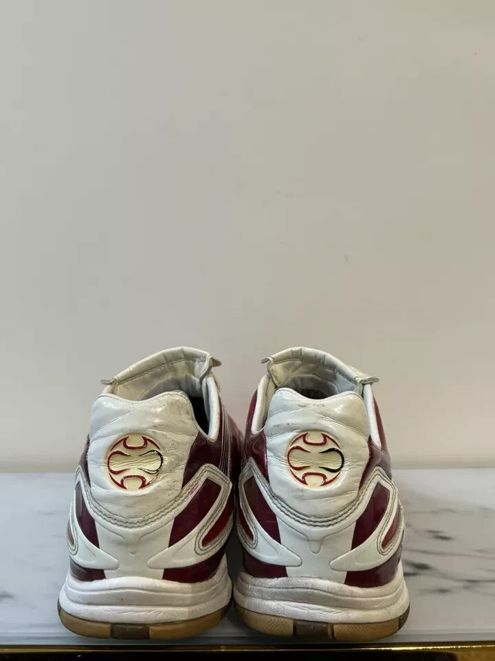 6973911