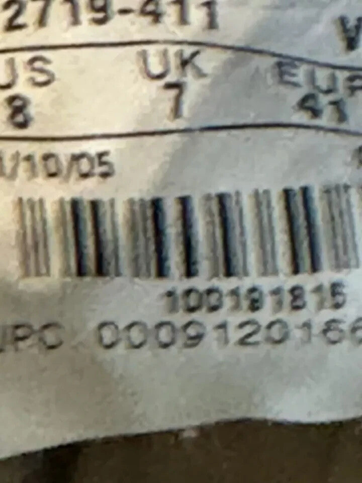 6973711