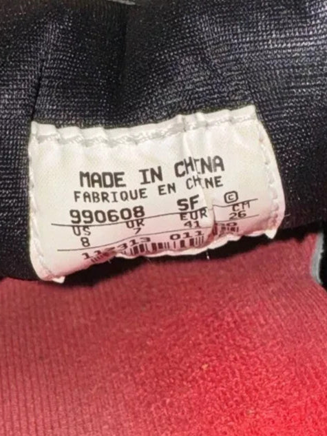 6973866