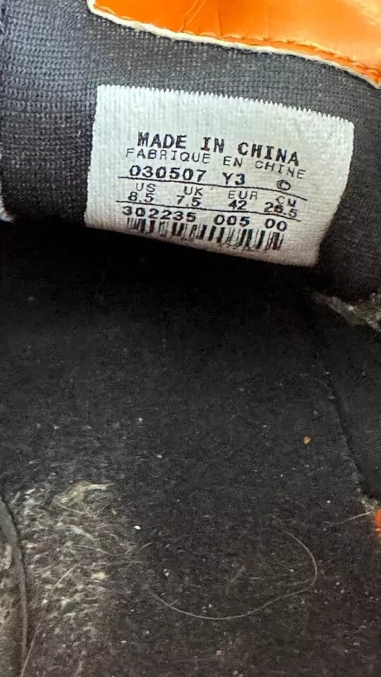 6973844