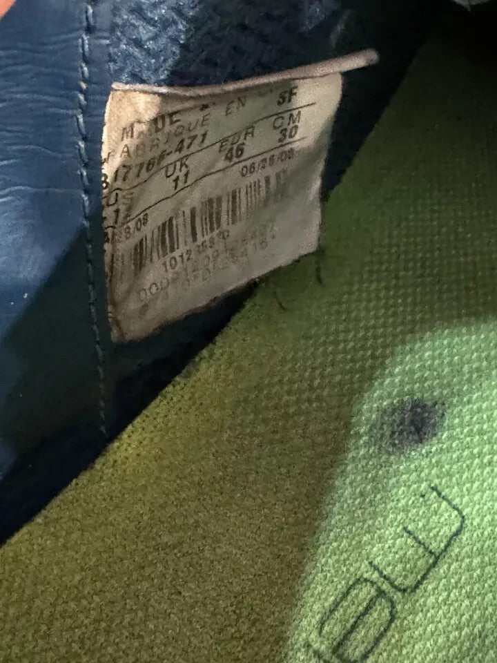 6973698
