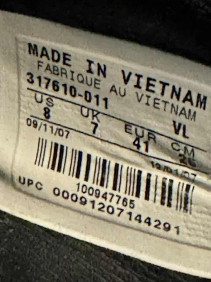 6973755