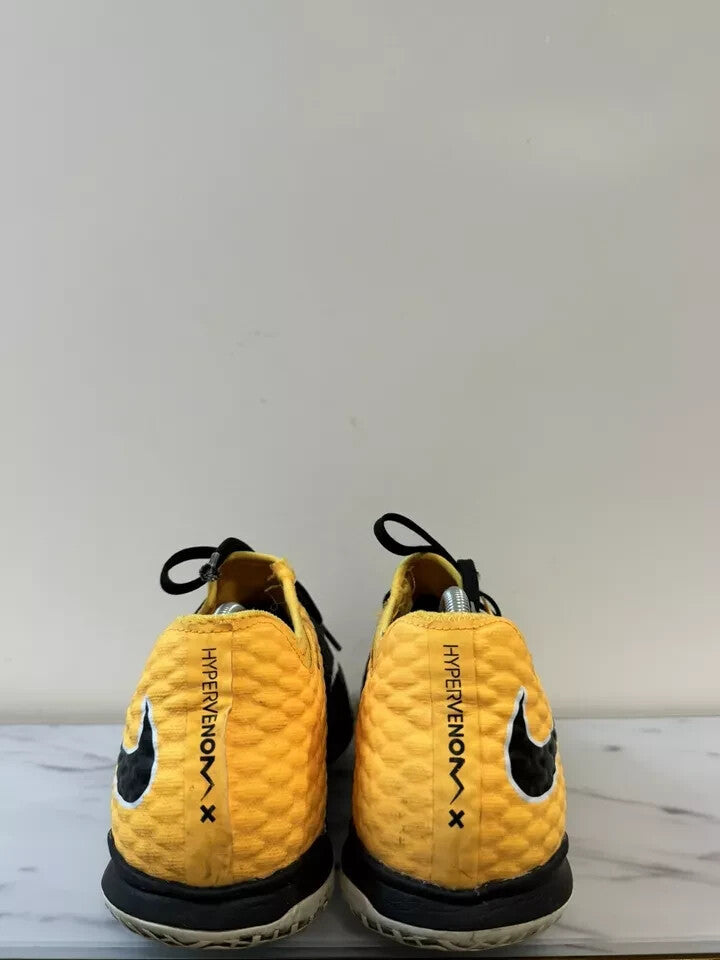 6973694