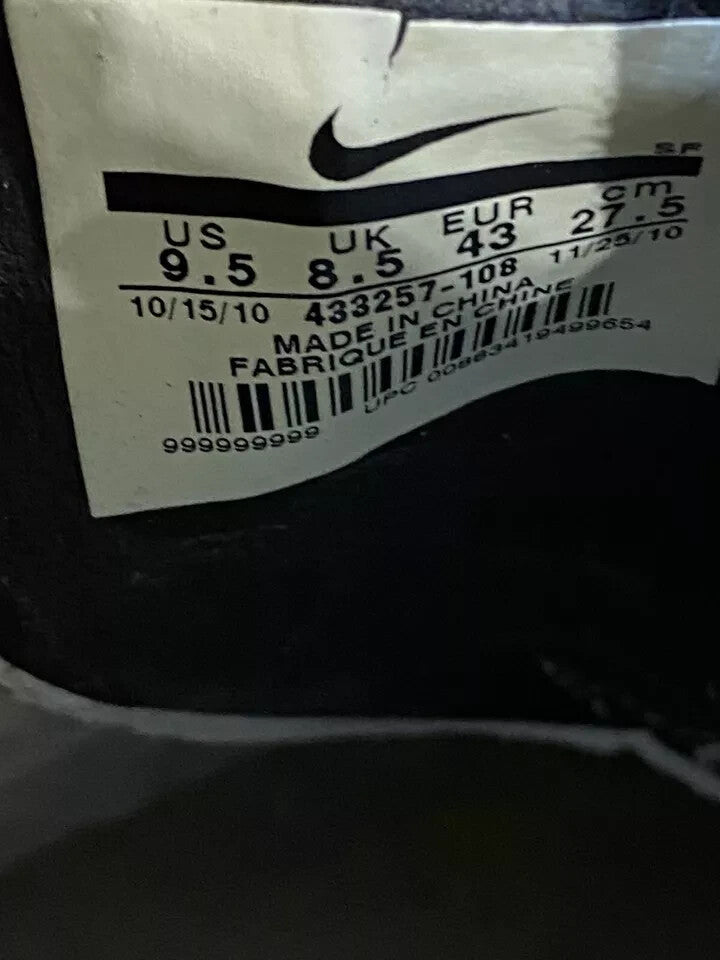 6973857