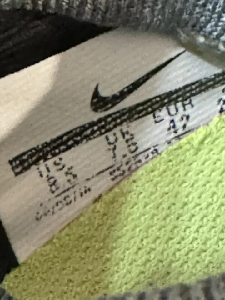 6973970