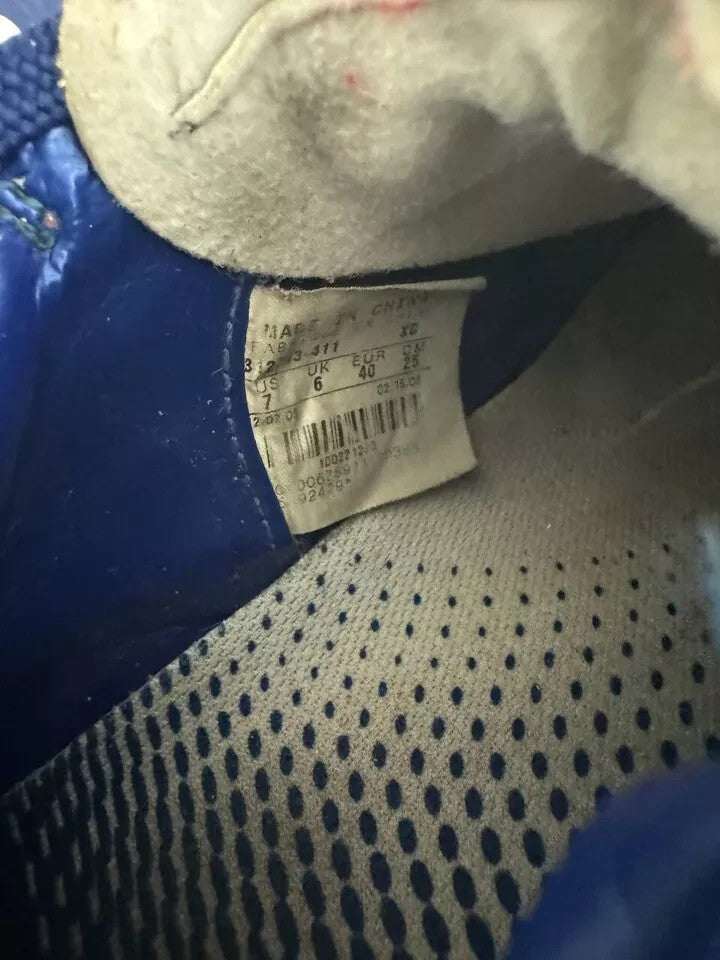 6973817