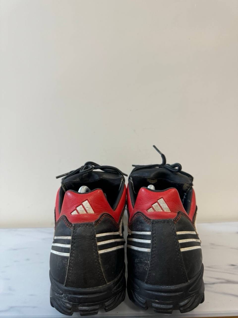 7699076