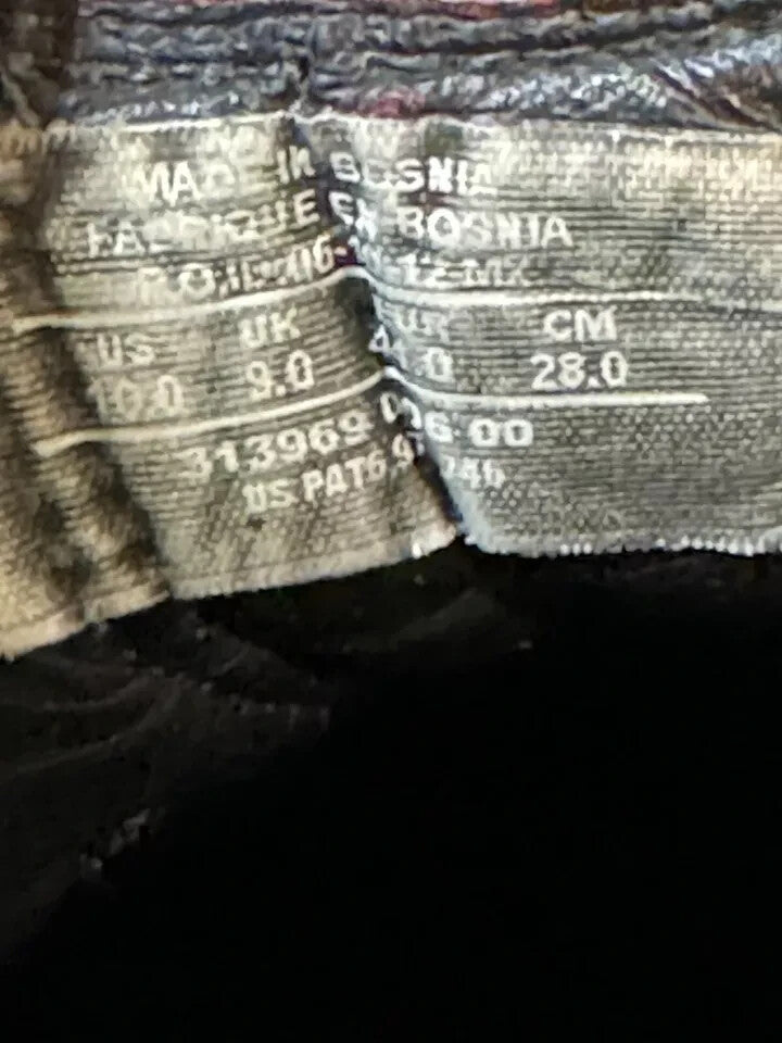 6973835