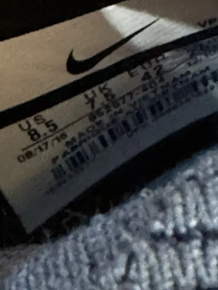 6973875