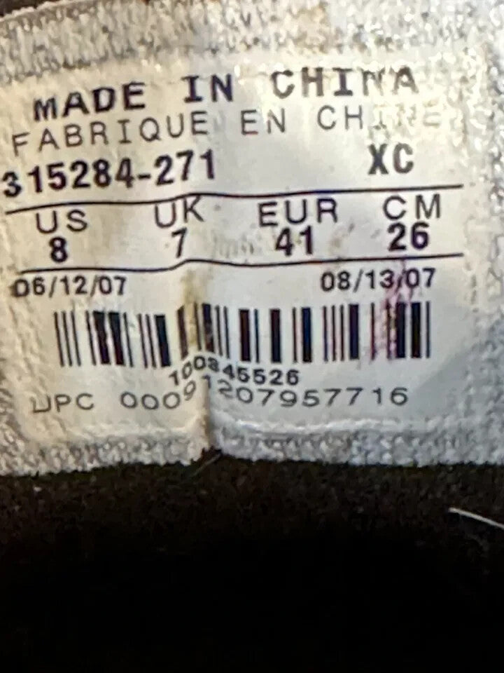 6973843