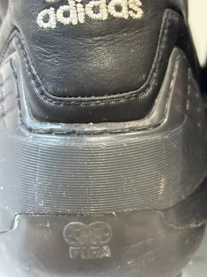 6973808