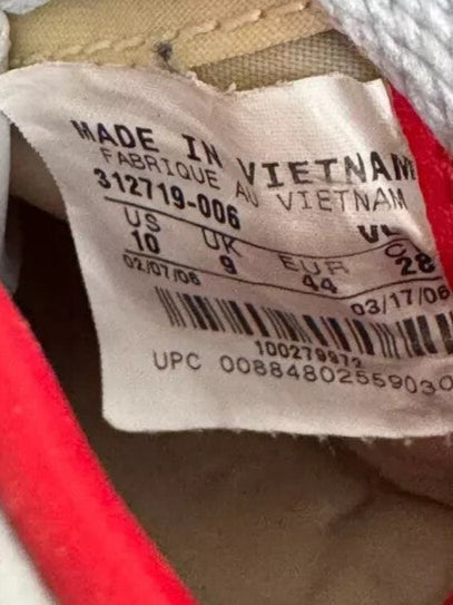6973744