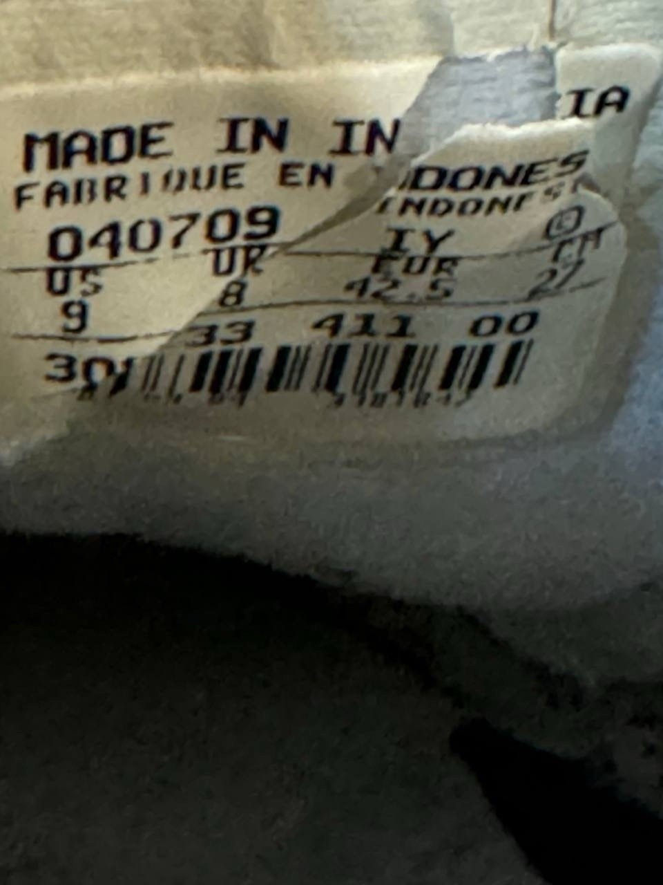 7698823