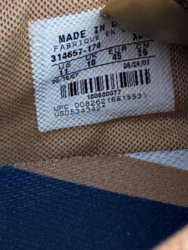 6973705