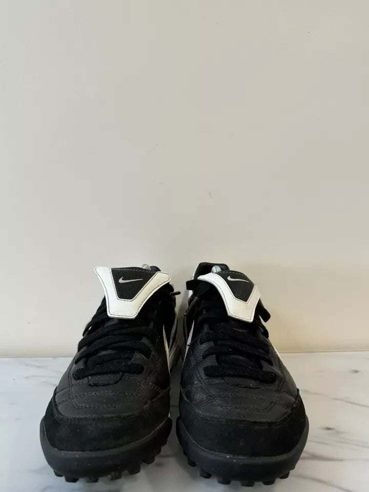6973755