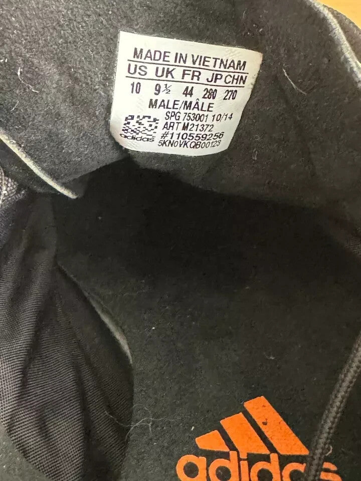 6973795