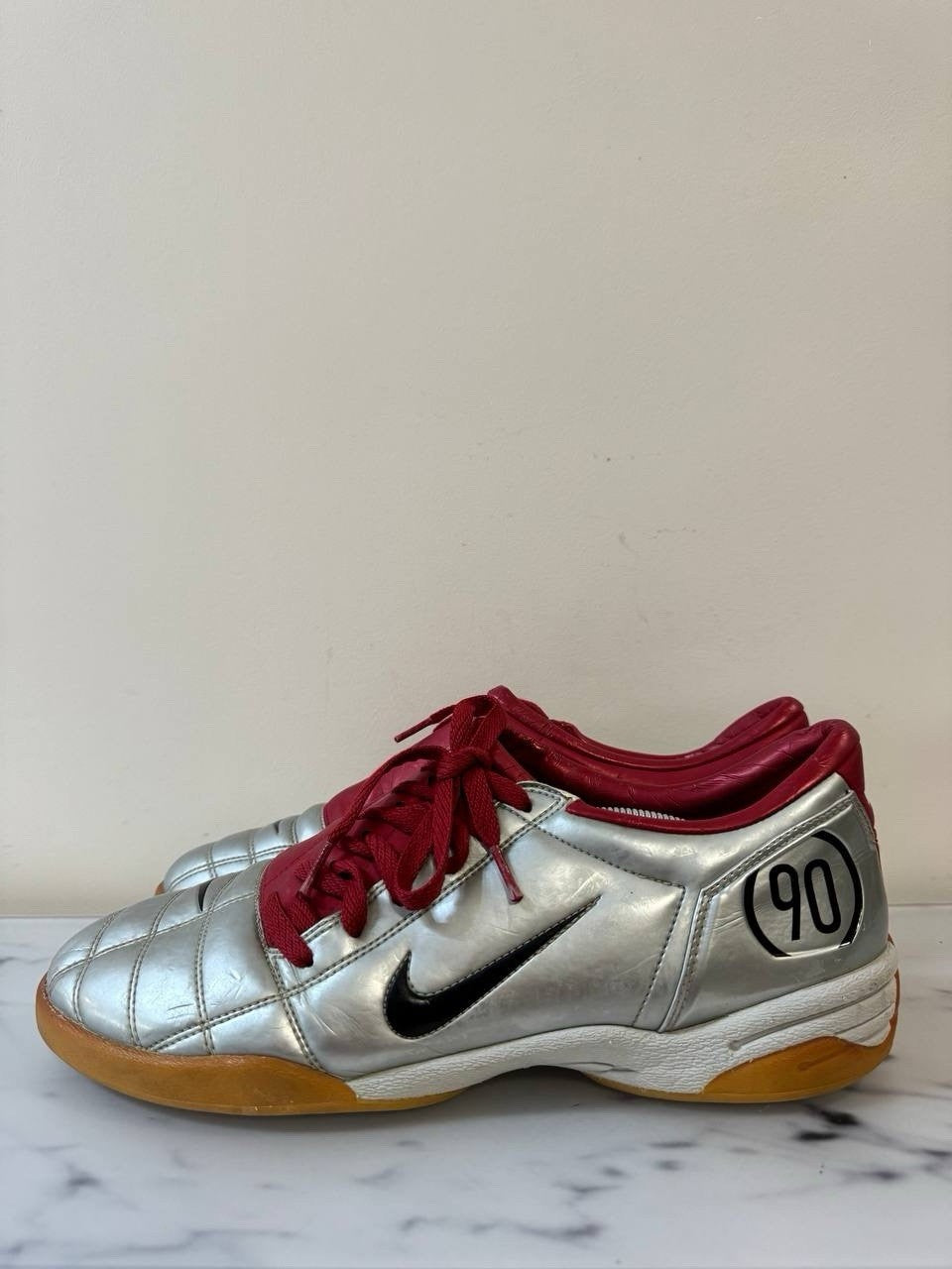 7698829
