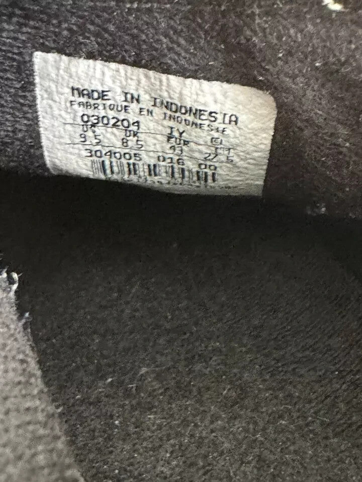 6973605