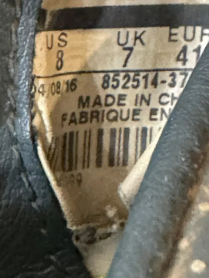 6973648