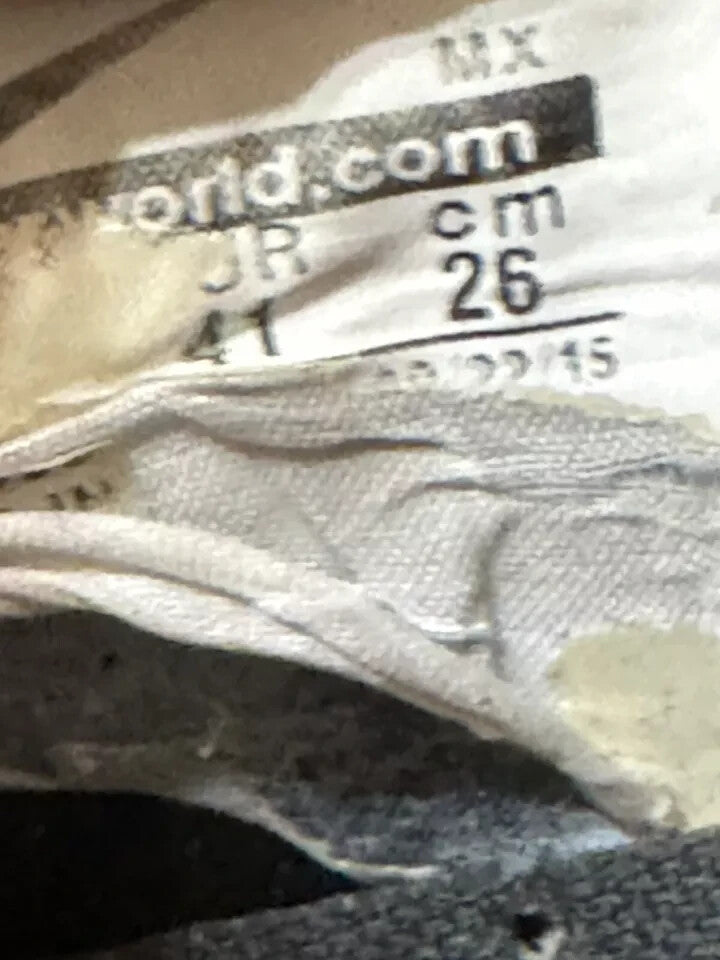 6973893