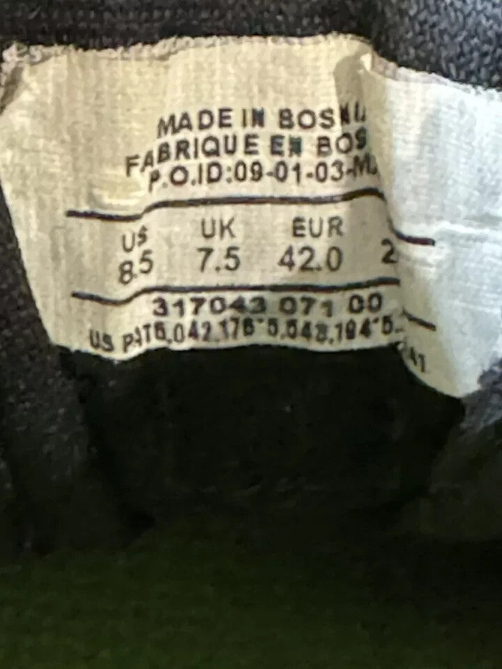 6973709