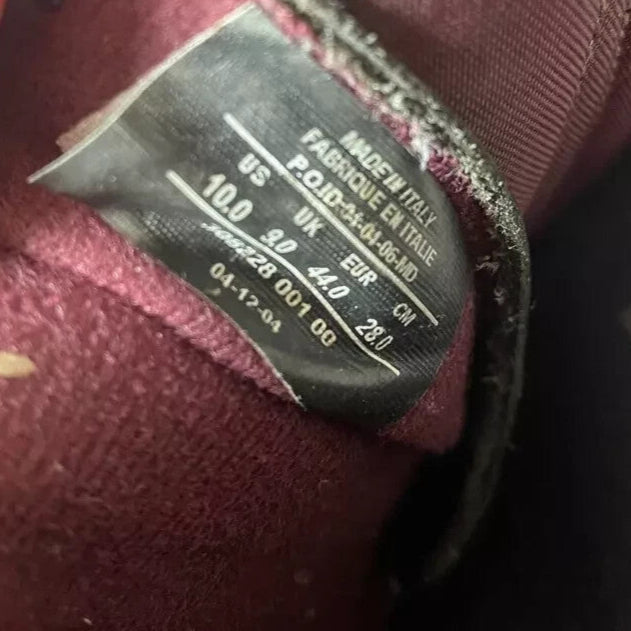 6973635