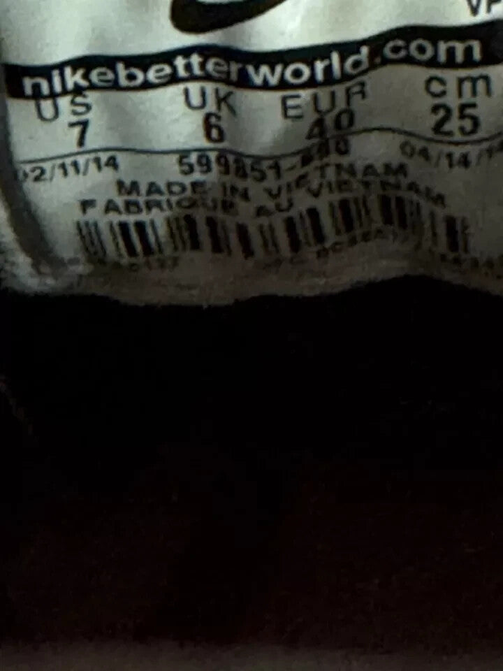 6973895