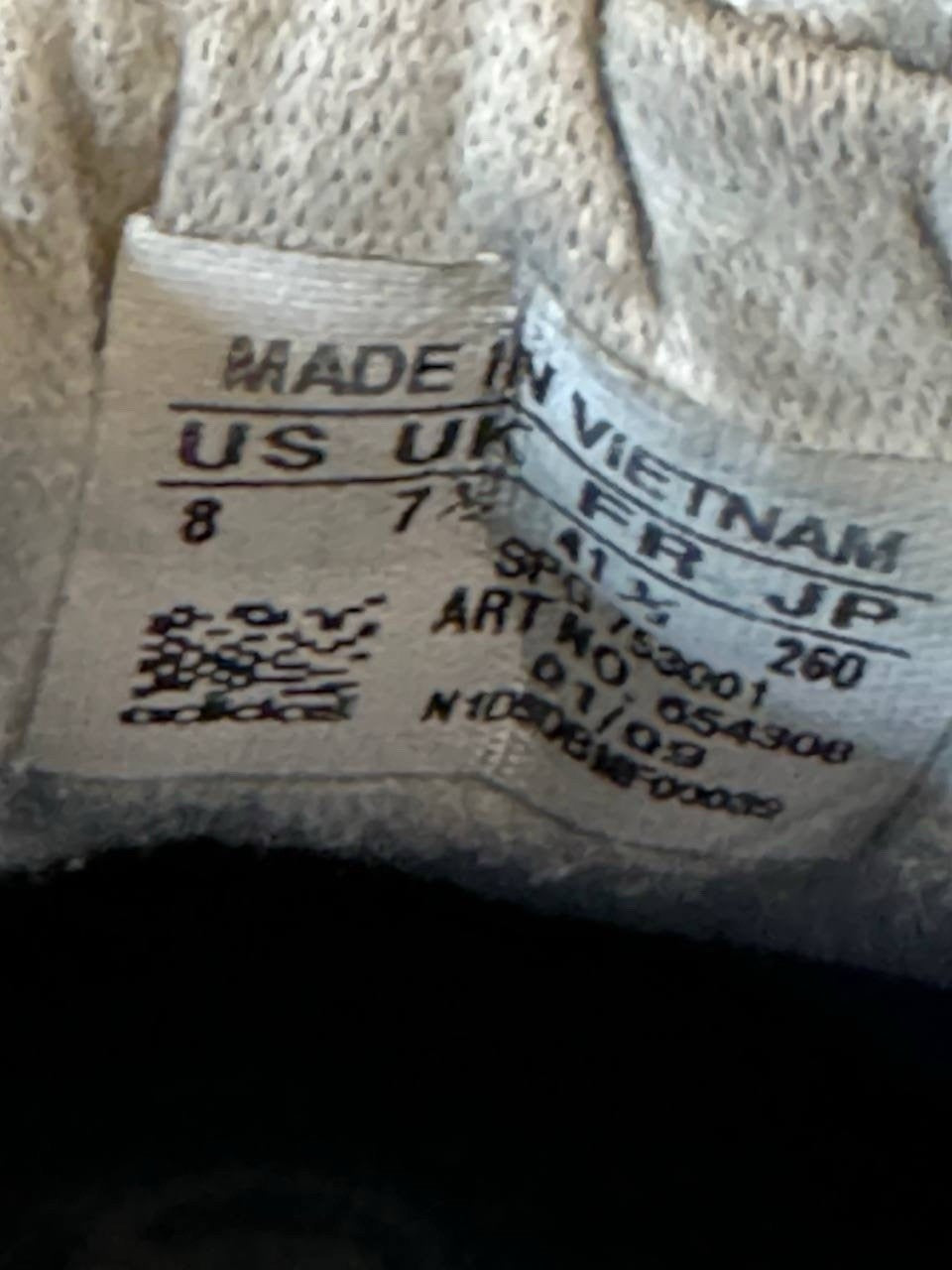 6973597