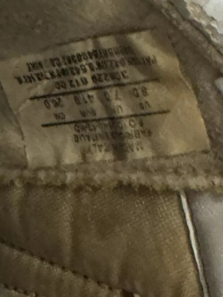 6973660