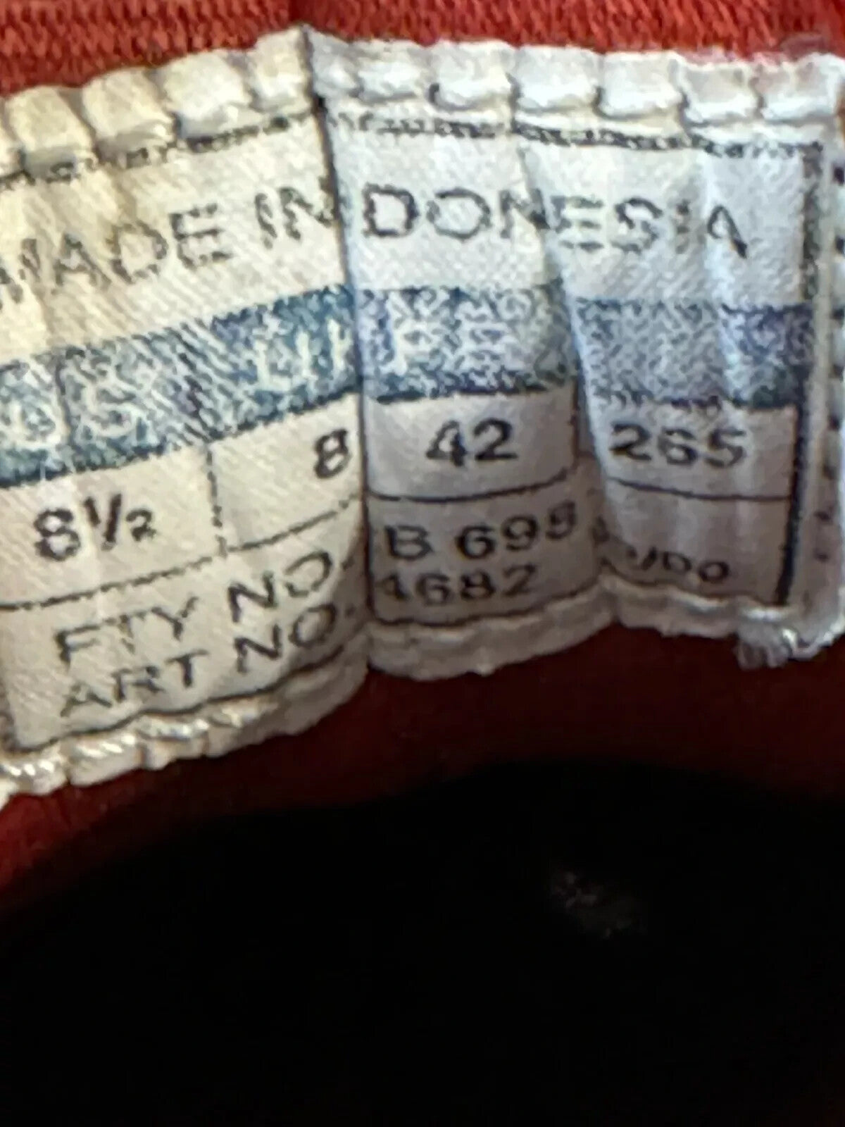 6973589