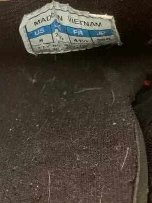 6973910