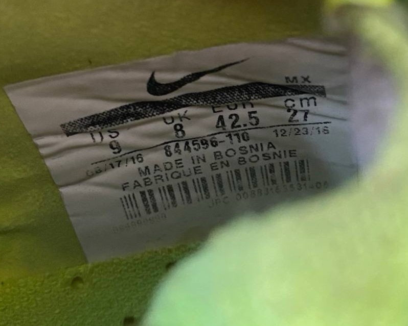 7698831
