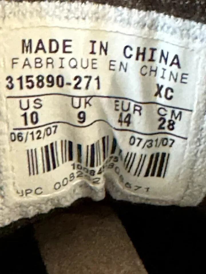 6973784