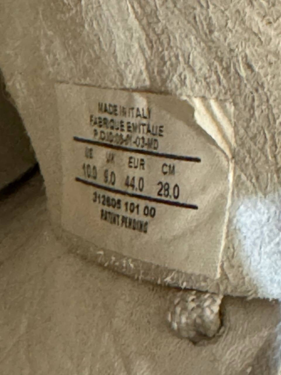 6973940
