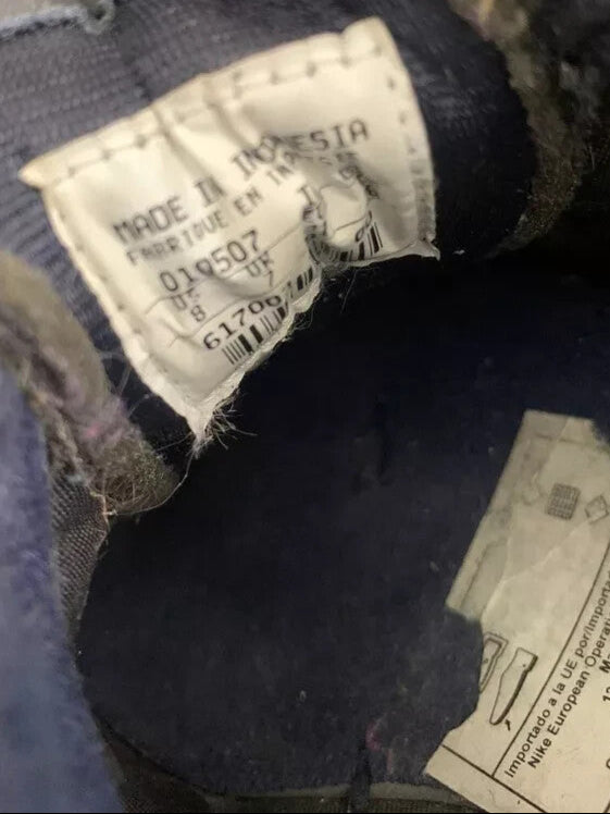 6973715