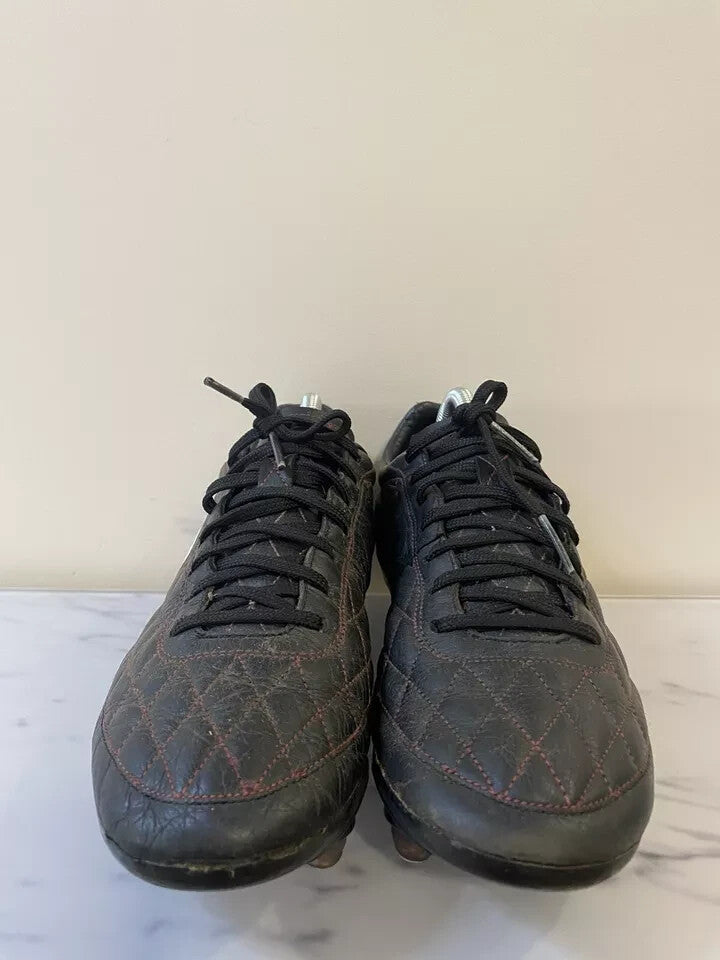 6973685