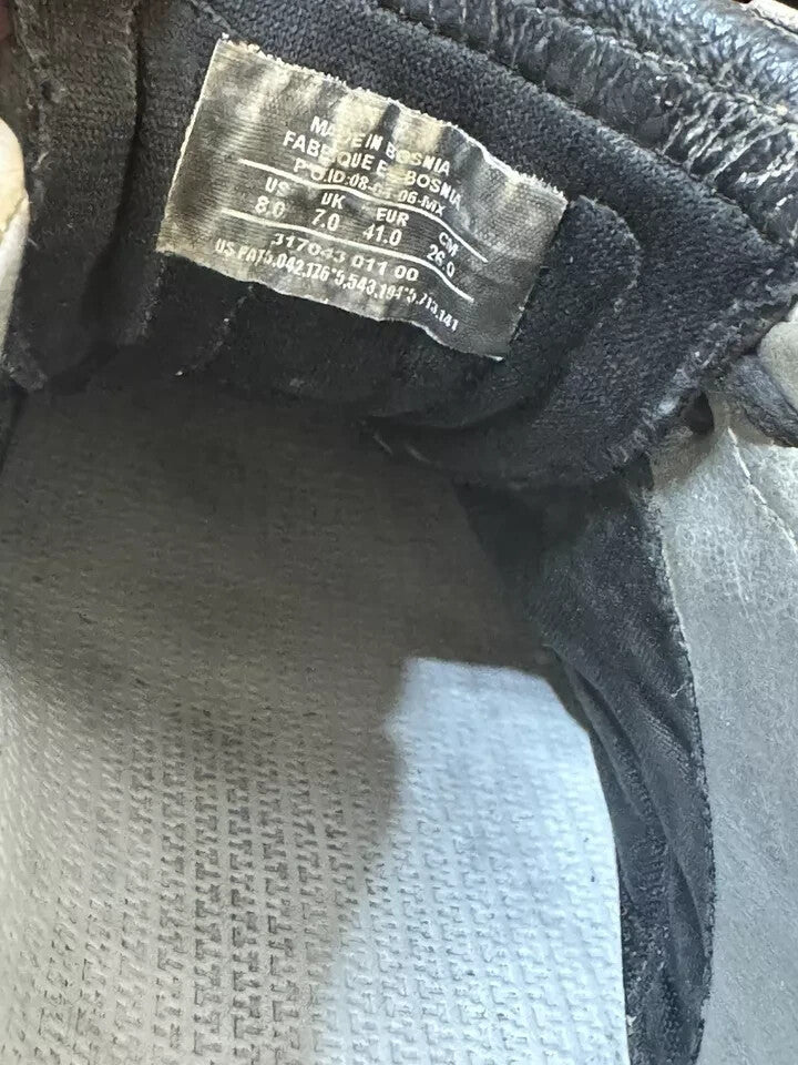 6973679