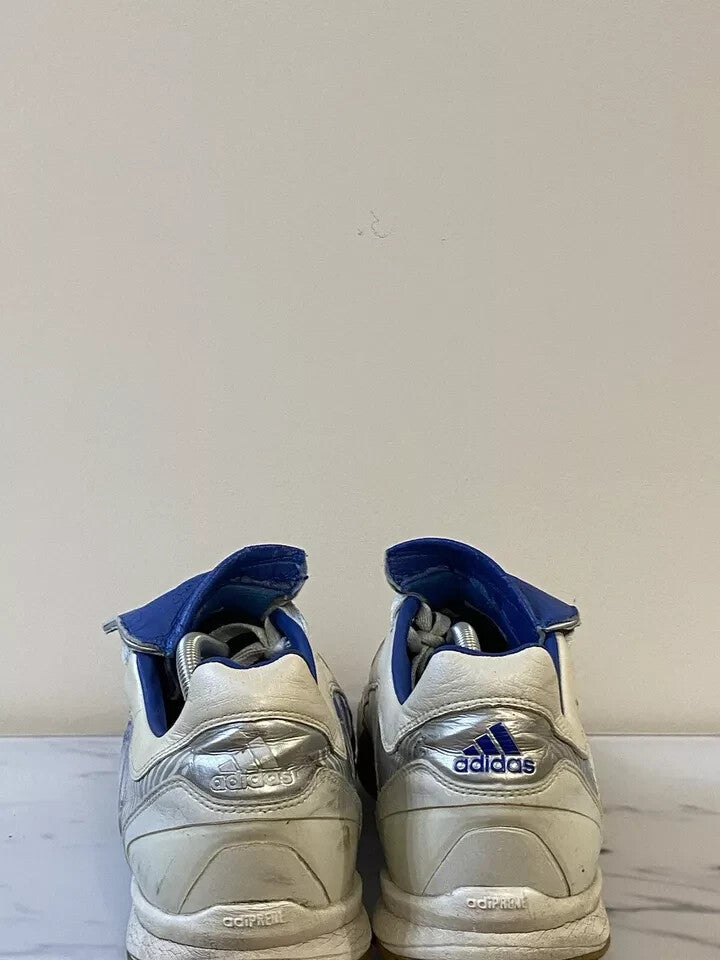 6973756