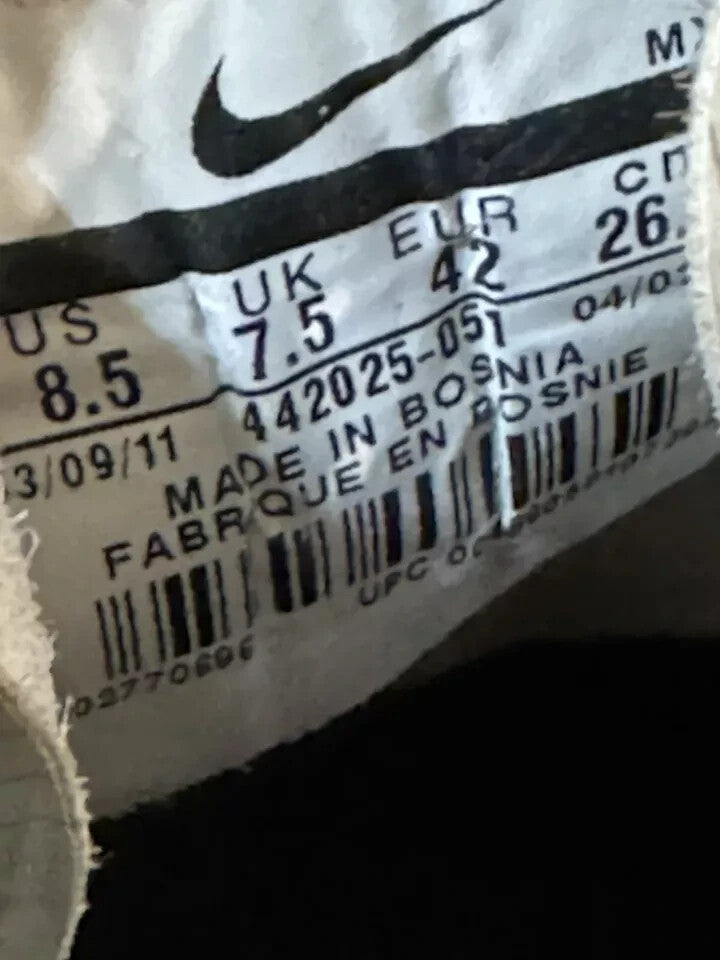 6973747